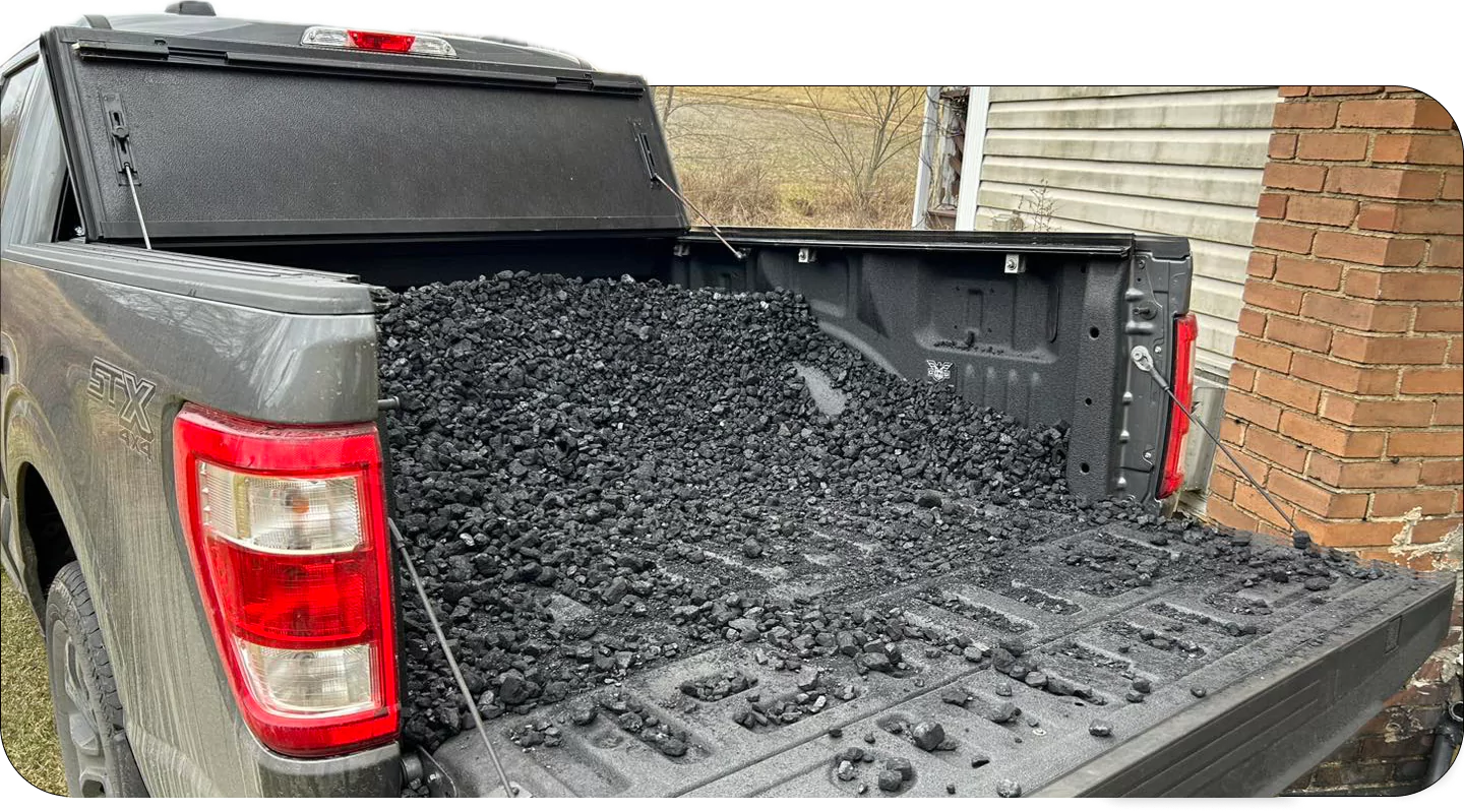 Truck Bed Loaded with Crushed Asphalt