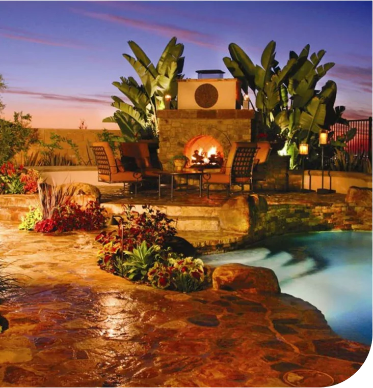 Outdoor patio with fireplace and polyurea pool