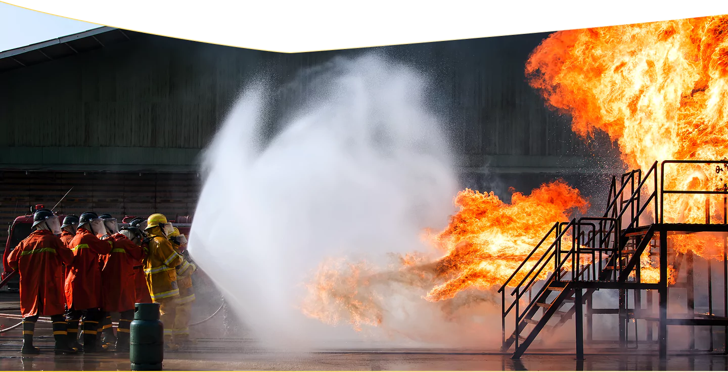 Firefighters extinguishing industrial fire