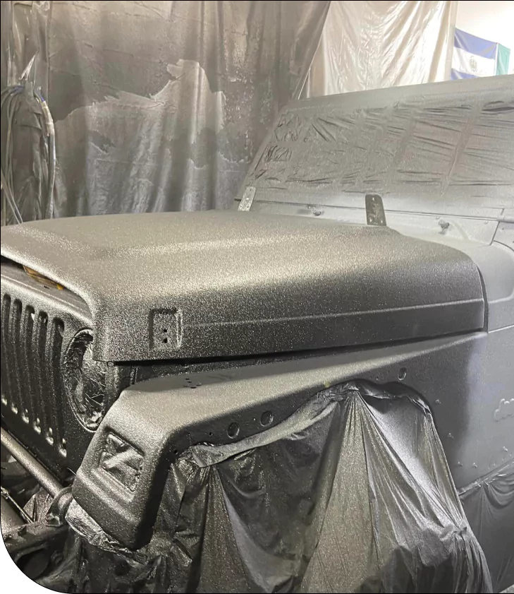 Jeep with textured black protective coating