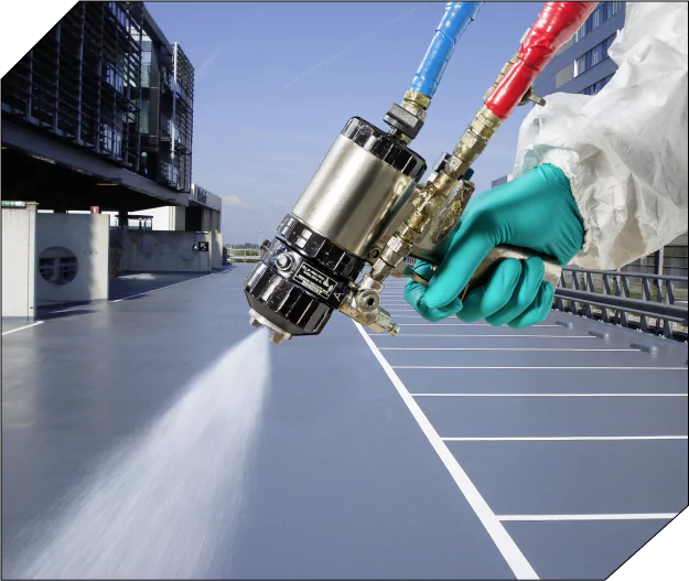 Spray Gun Applying Protective Polyurea Coating