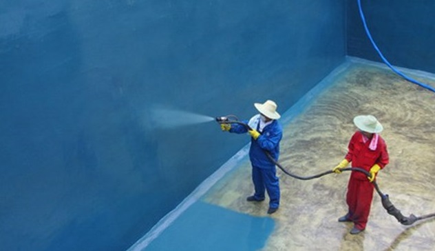 Applying protective coating inside a tank